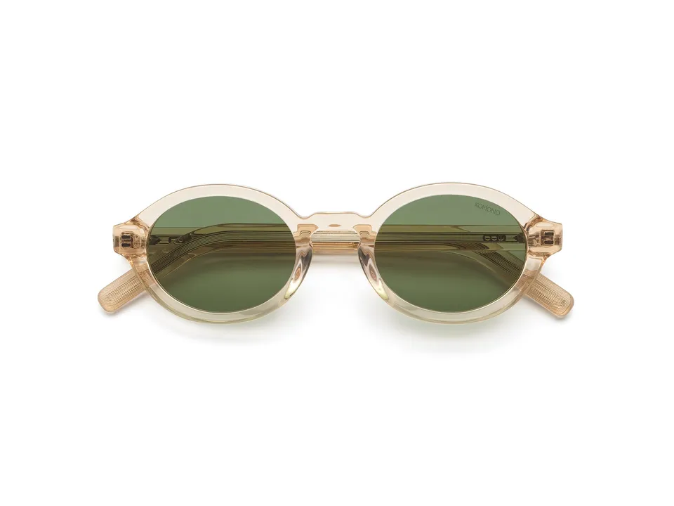 komono-jace-champagne-lunettes-de-soleil-ovales-en-ac-tate-verres-polaris-s-tail image 1