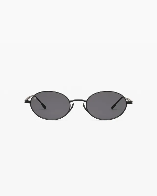 jimmy-fairly-la-elvie-lunettes-de-soleil-ovales-en-titane-noires-homme image 1